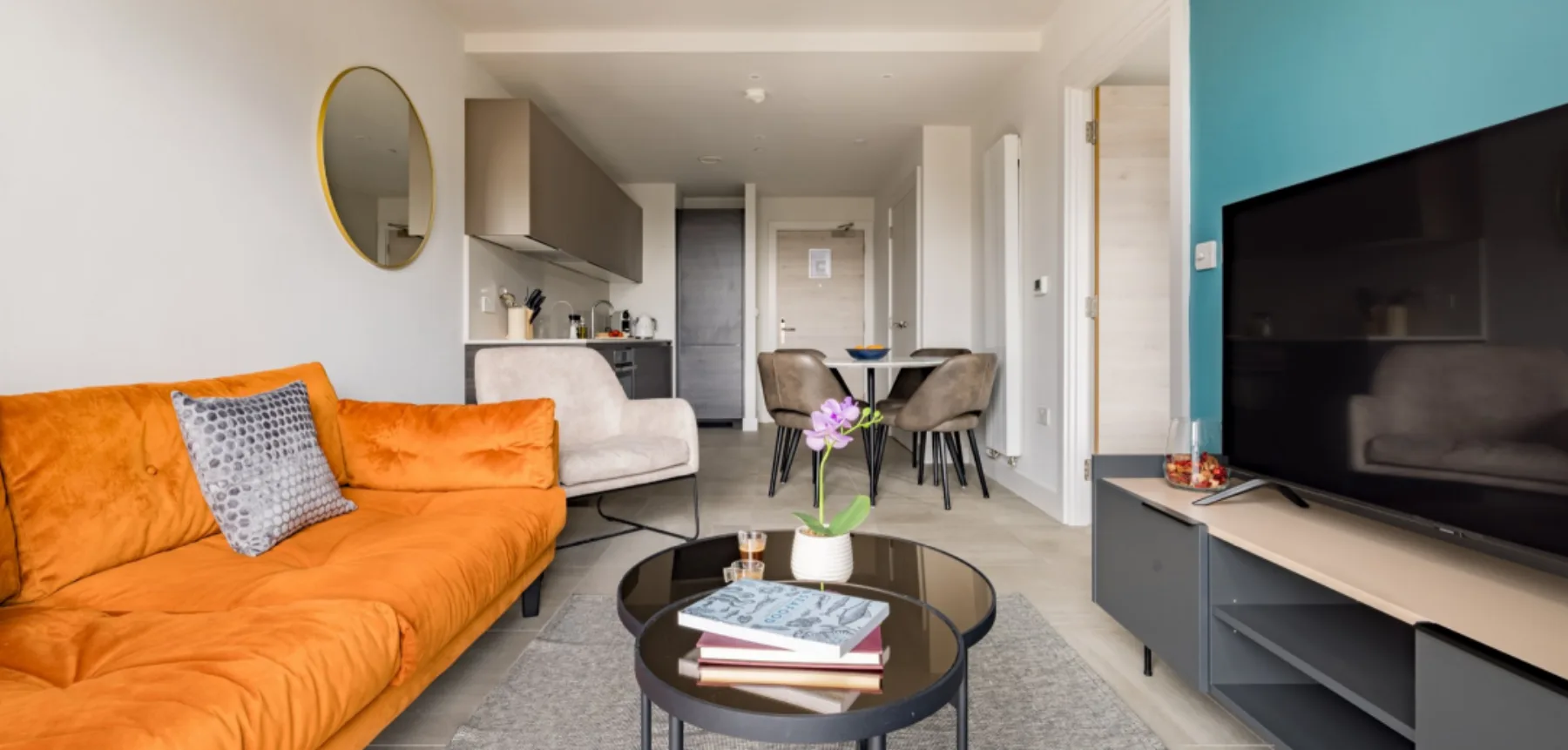 A Charles Hope apartment kitchen and living space